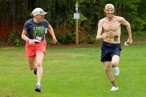 Runners sprint to the finish line at the Whitaker Wander 5k