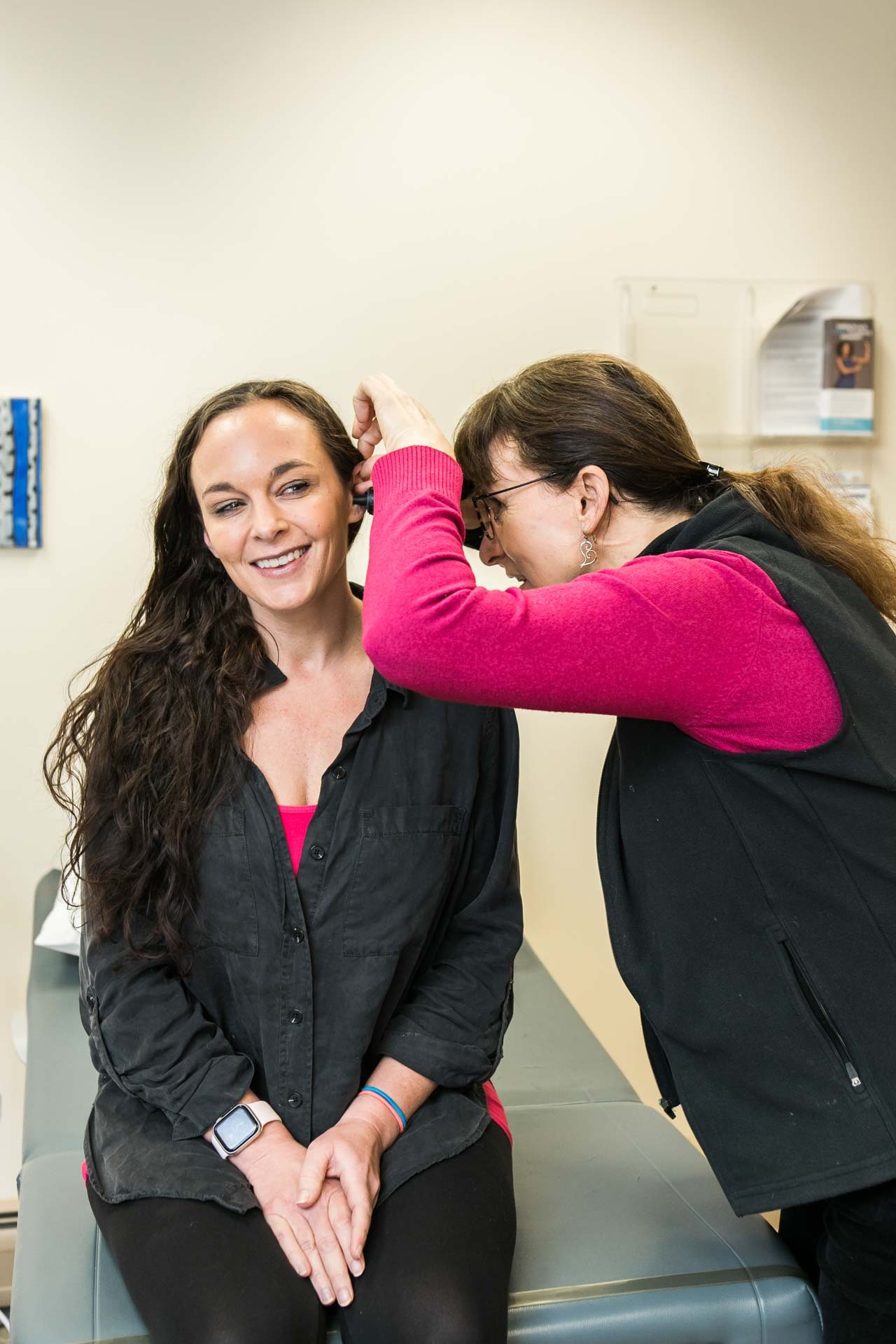 Smiling during ear exam