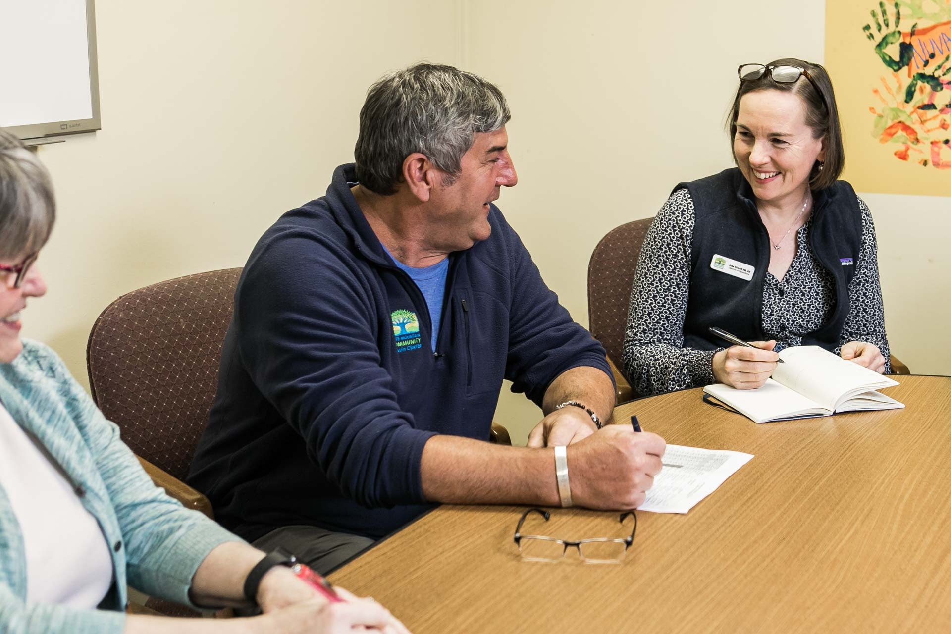 Joyous meeting of board members